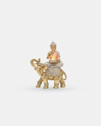 Decorative Buddha sitting on a golden elephant statue, authentic Thai-style home decor, luxurious gold finish by Thailora